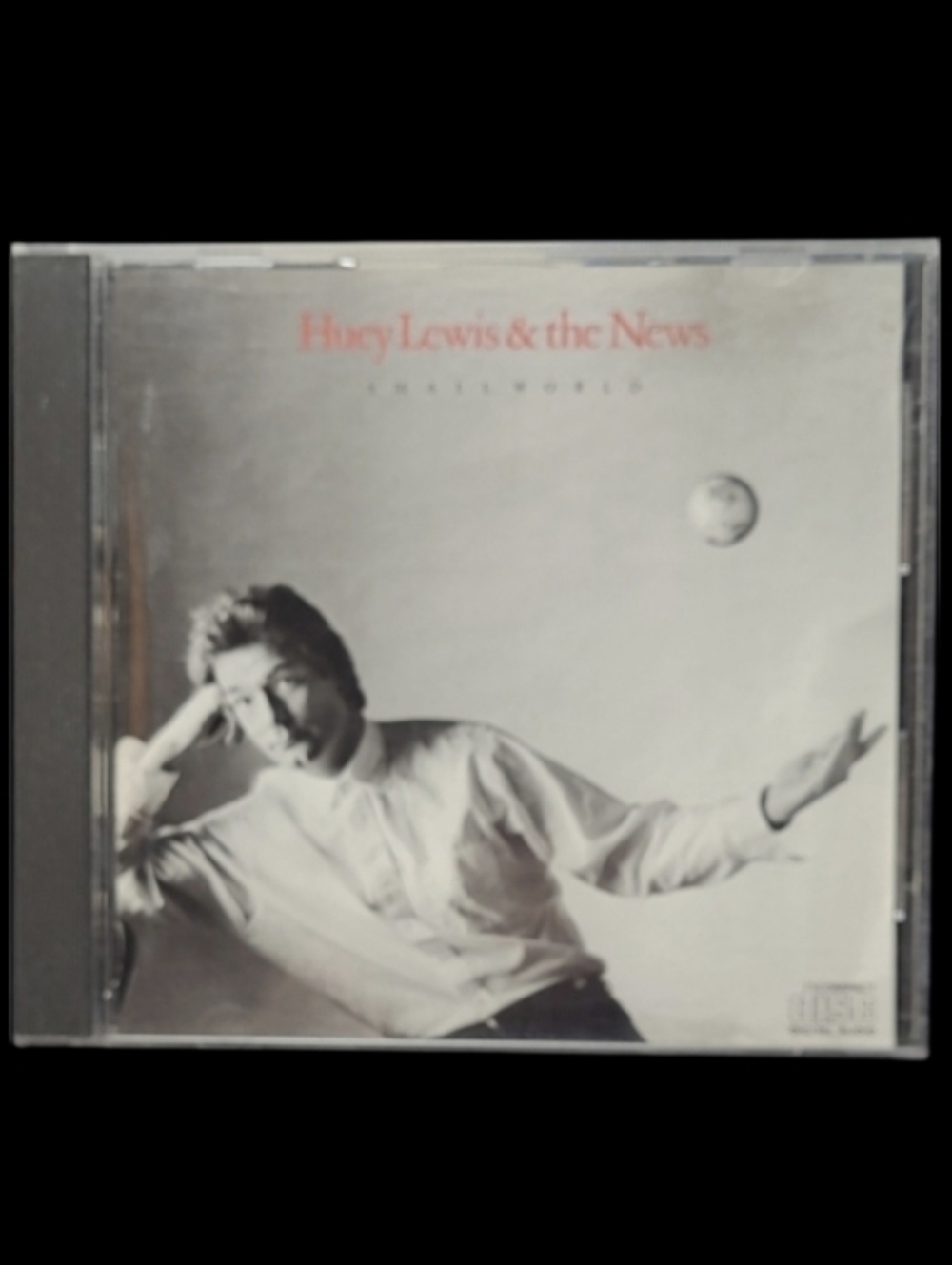 MUSIC CD  1988 "HUEY LEWIS & THE NEWS" SMALL WORLD